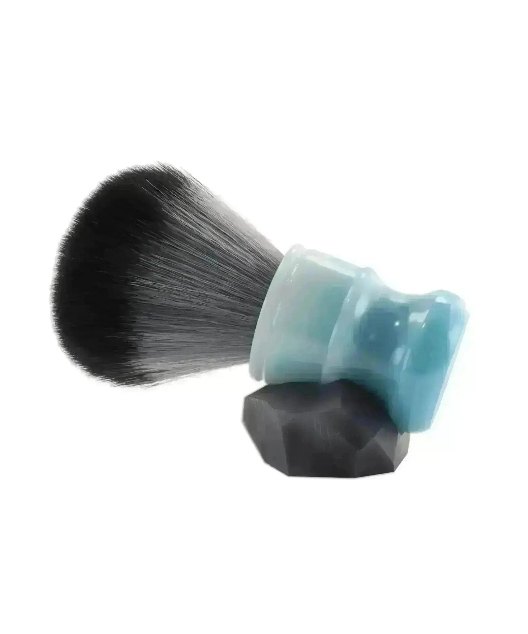 a close up of a brush on a white background